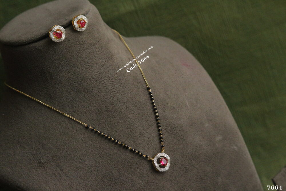 CZ ruby stone pendant set with gold chain and black beads