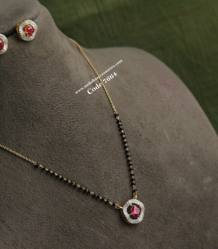 CZ ruby stone pendant set with gold chain and black beads