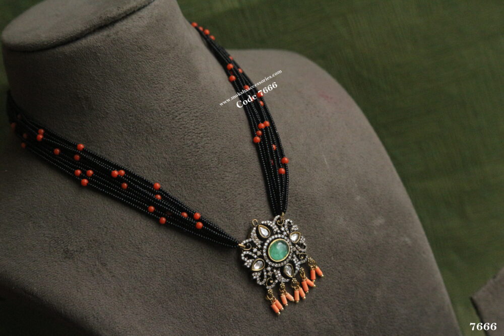 CZ pendant with black beads and corals
