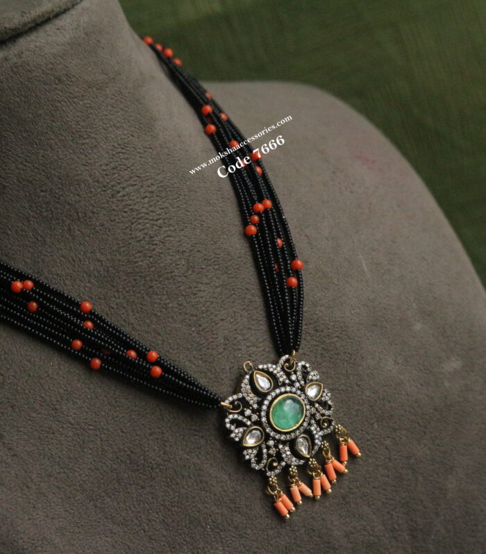 CZ pendant with black beads and corals