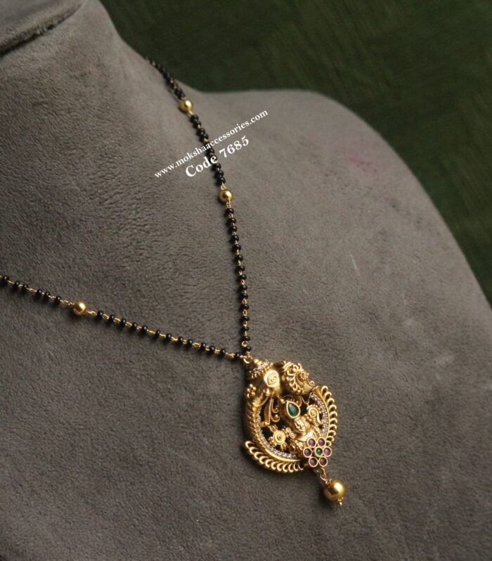 Balaji pendant with black beads and gold balls