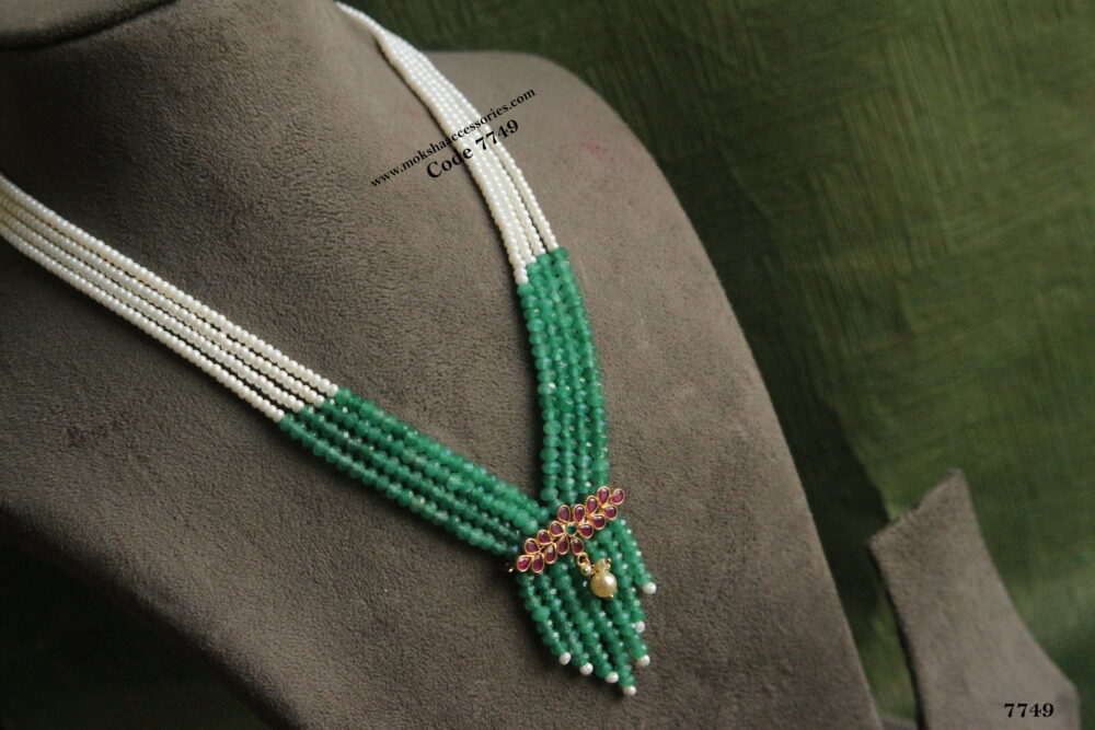 Ruby pendant with emerald and pearl mala