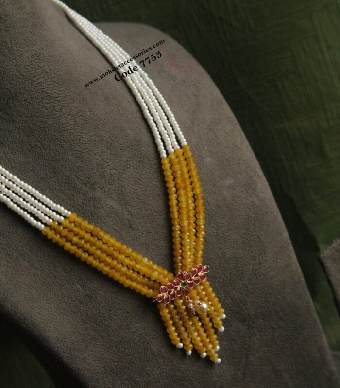 Ruby pendant with yellow beads and pearl mala
