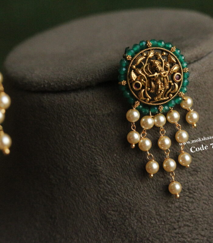 Earrings with sarvoski pearl drops