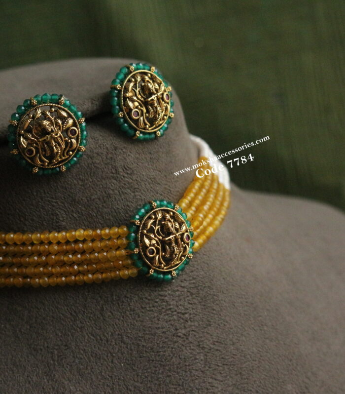 Krishna pendant with yellow and pearl choker set