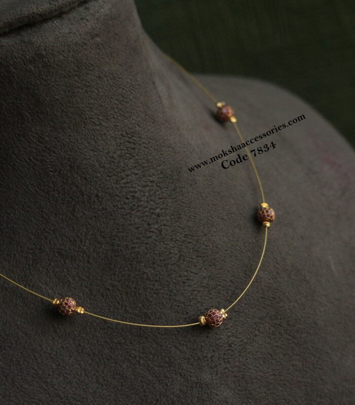 Invisible chain with ruby stone balls