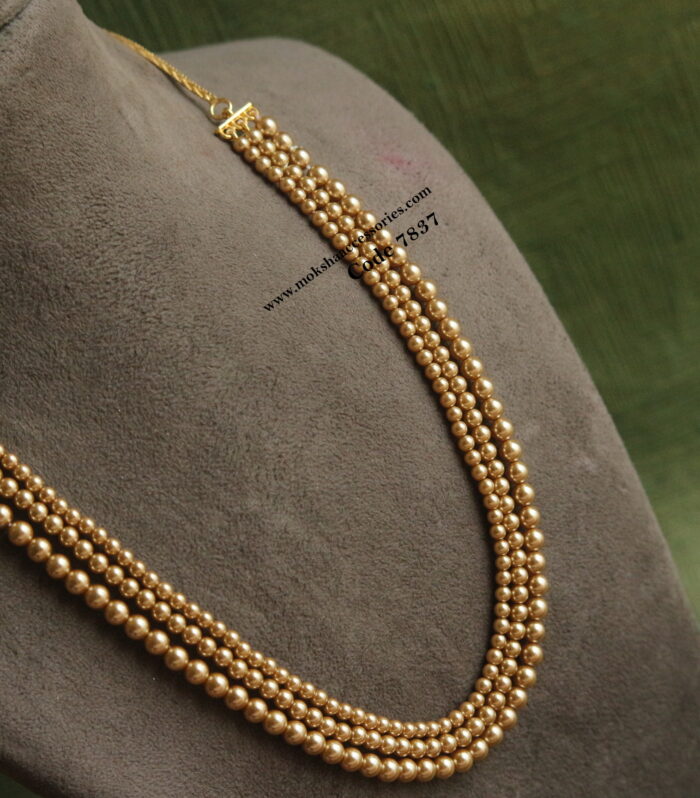 Shell pearl mala with gold chain