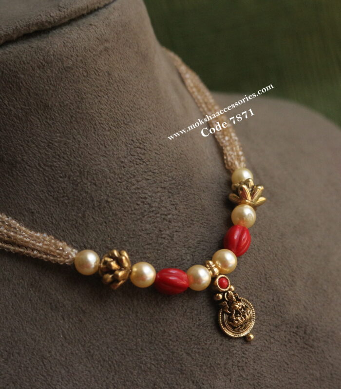 Kasu pendant with coral and sugar beads
