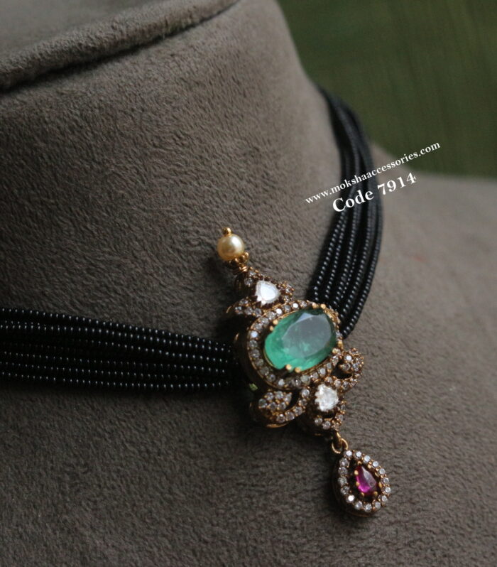 Real emerald stone with black beads