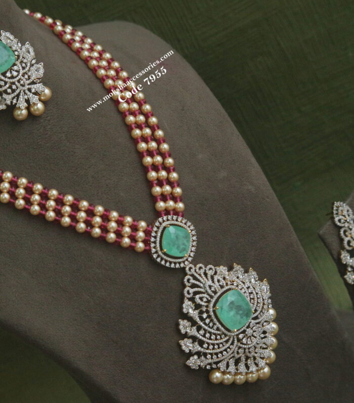 Diamond alike pendant set with sarvoski pearl and ruby beads mala