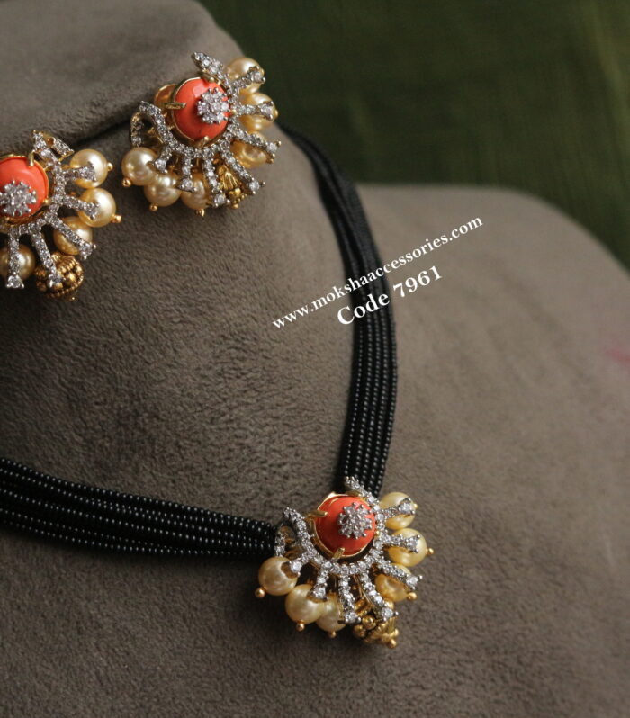 Coral cz pendant set with black beads