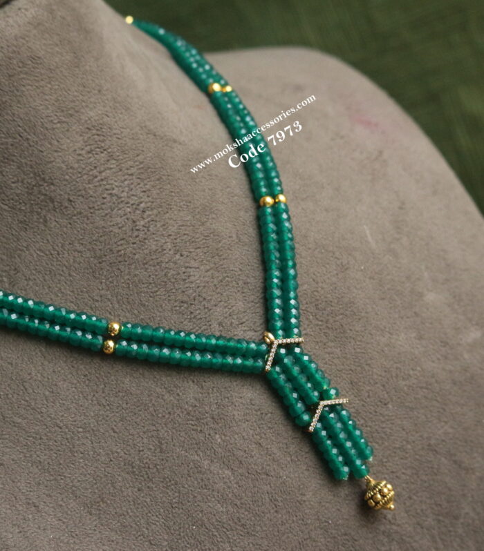 Emerald beads with gold balls