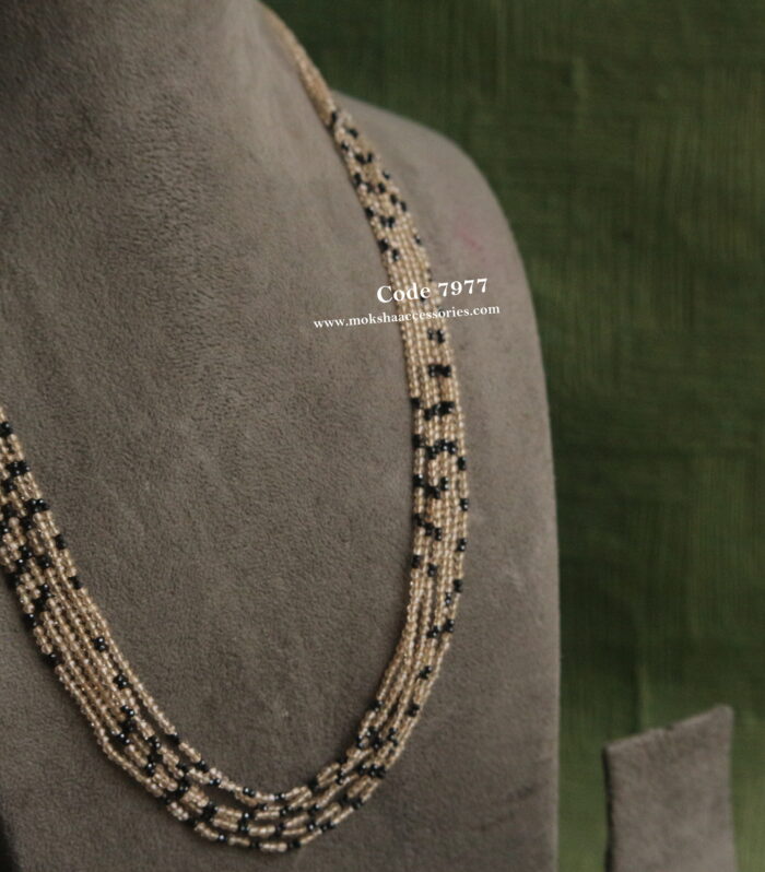 Skin color beads with black beads mala