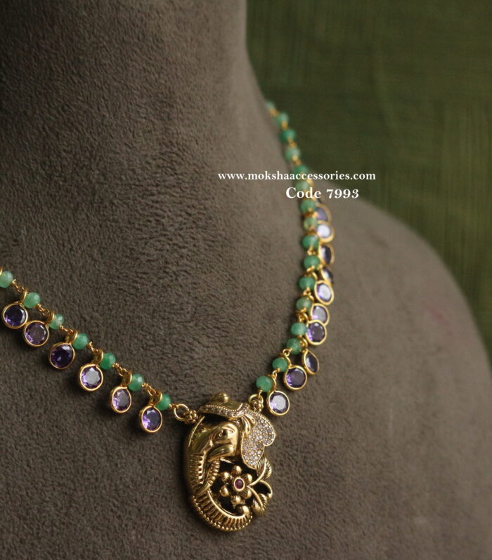 Ganesh pendant with real emerald beads and cz purple drops