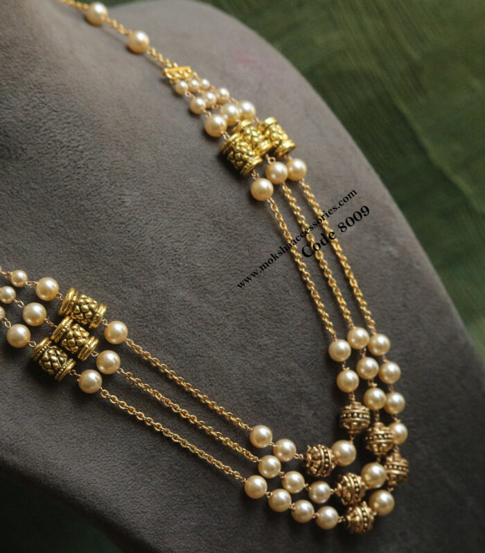 Gold chain with antique gold balls and sarvoski pearl chain