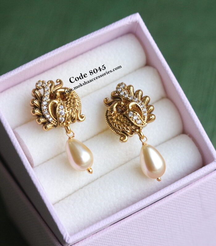 Peacock studs with pearl drops