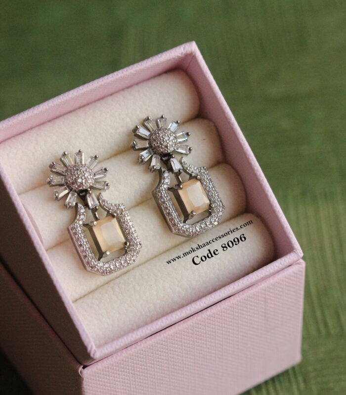 CZ studs with lite pink stone