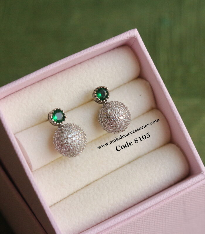 Silver studs with emerald stone