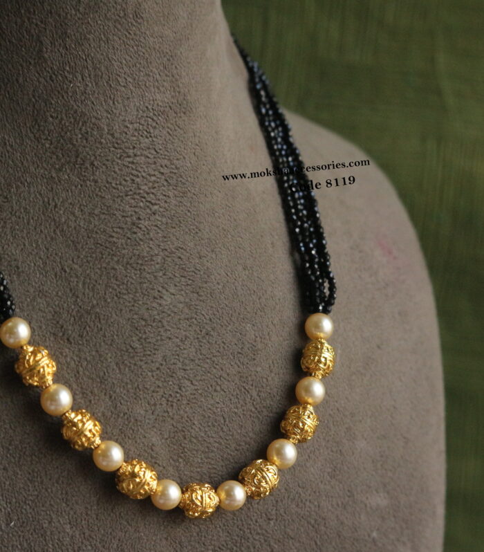 Gold balls with sarvoski pearl and black beads