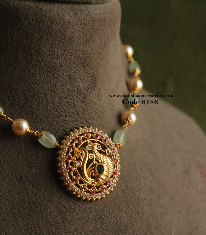 Gold peacock pendant with real emerald and pearl choker