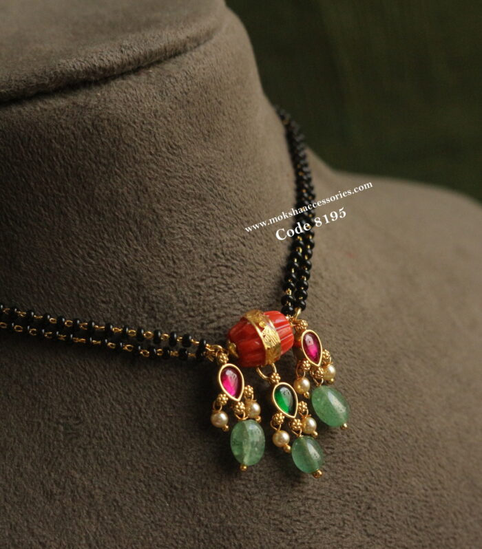 Real coral pendant with black beads