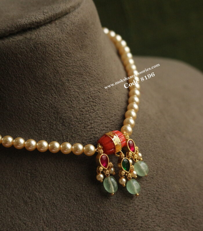 Real coral pendant with sarvoski pearl