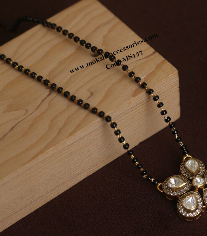 92.5 silver pendant with black beads (5.6 gms pendant, 3.3 gms black beads)