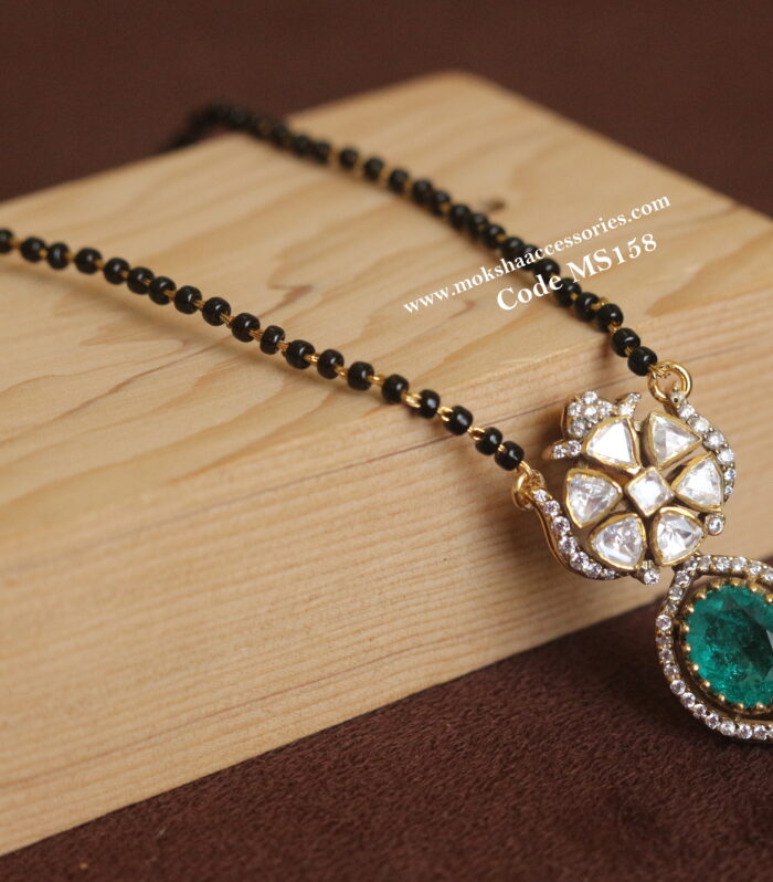 92.5 silver pendant with black beads (5.5 gms pendant, 3.3 gms black beads)