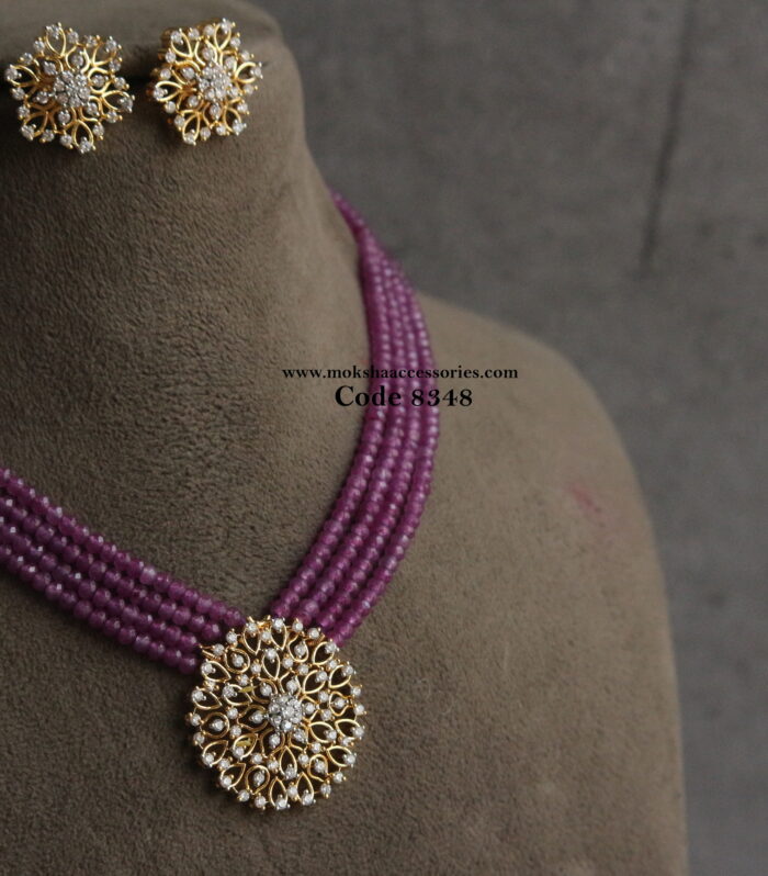 CZ diamond alike pendant set with purple beads