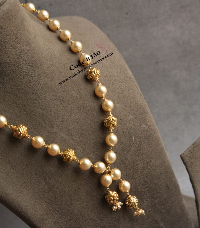 Sarvoski pearl with antique gold beads mala