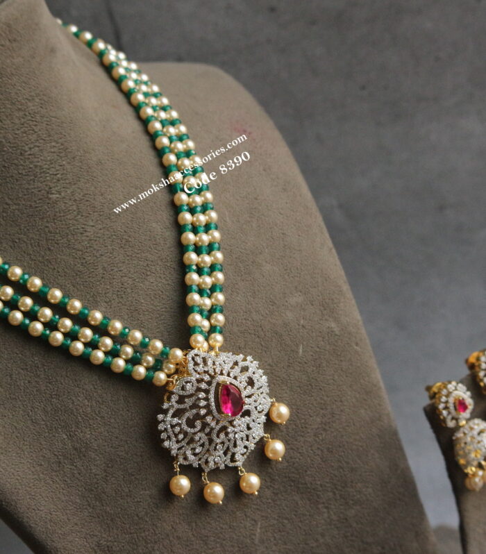 Diamond alike ruby stone pendant set with sarvoski pearls and ruby beads