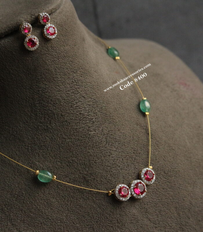 Diamond alike ruby stone pendant with invisible chain and real emerald beads