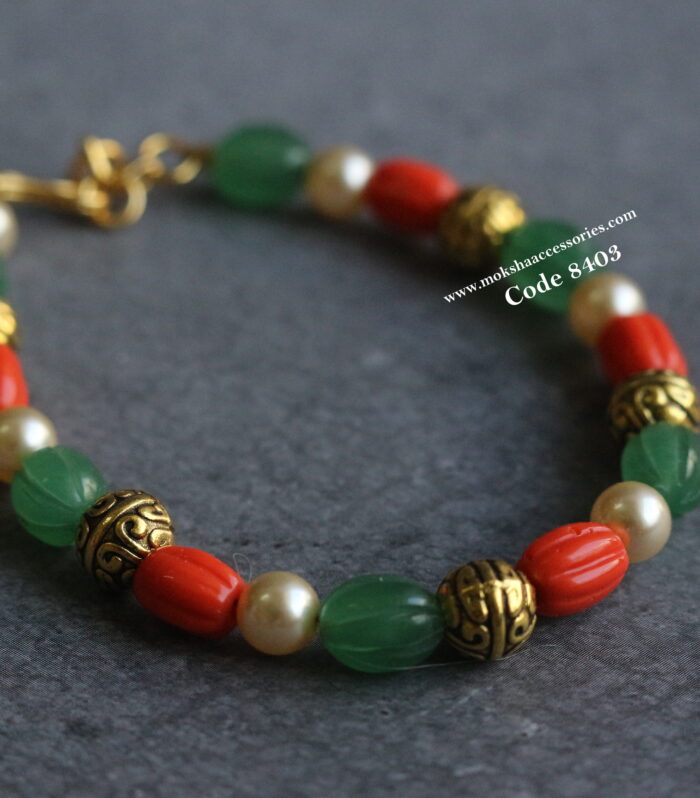 Coral , pearl and strawbery beads bracelet with adjustable chain