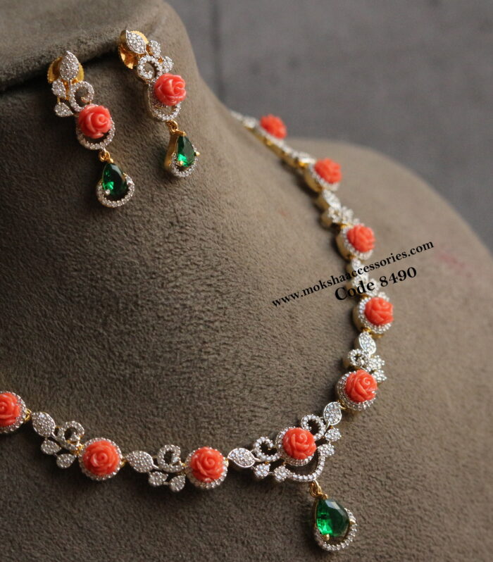 Coral and cz neckset with emerald stone drop