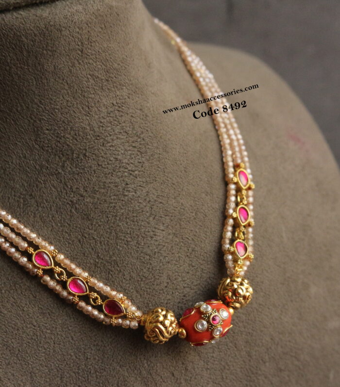 Real coral with antique gold balls and real CZ beads