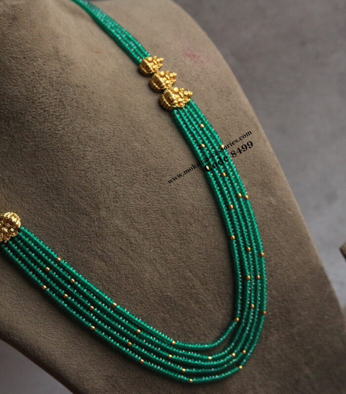 Emerald and gold balls mala with antique lakshmi devi pendants