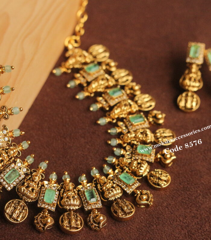 Antique gold lakshmi devi neckset with mint green stones