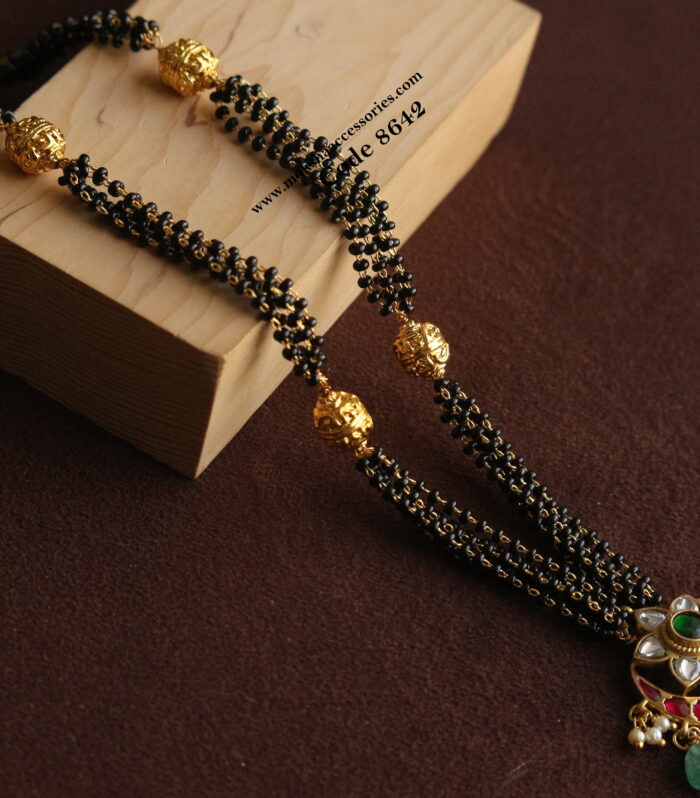 Gold balls with jadaukundan pendant and black beads