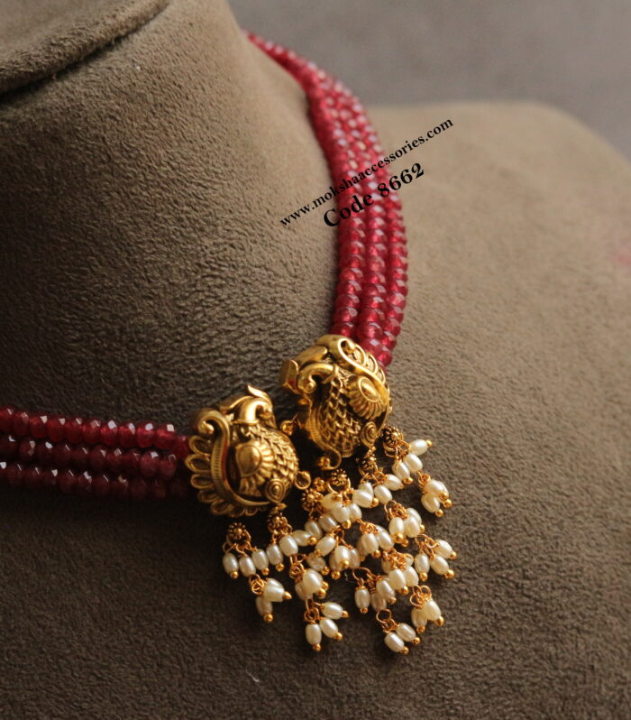 Nakshi pendant with ruby maroon beads and rice pearl drops choker