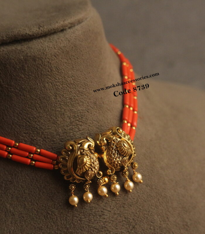 Nakshi pendant with coral and gold balls