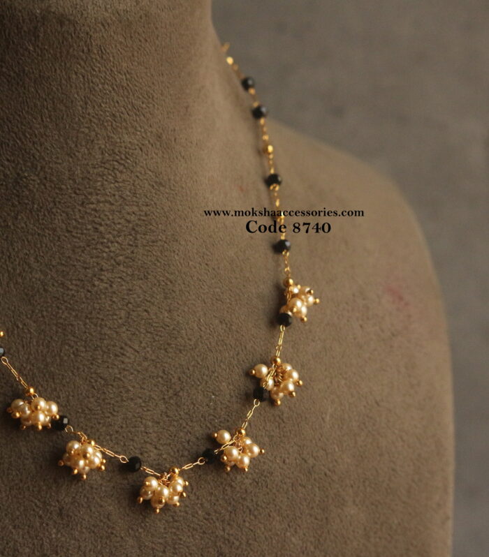 Black beads with sarvoski pearls