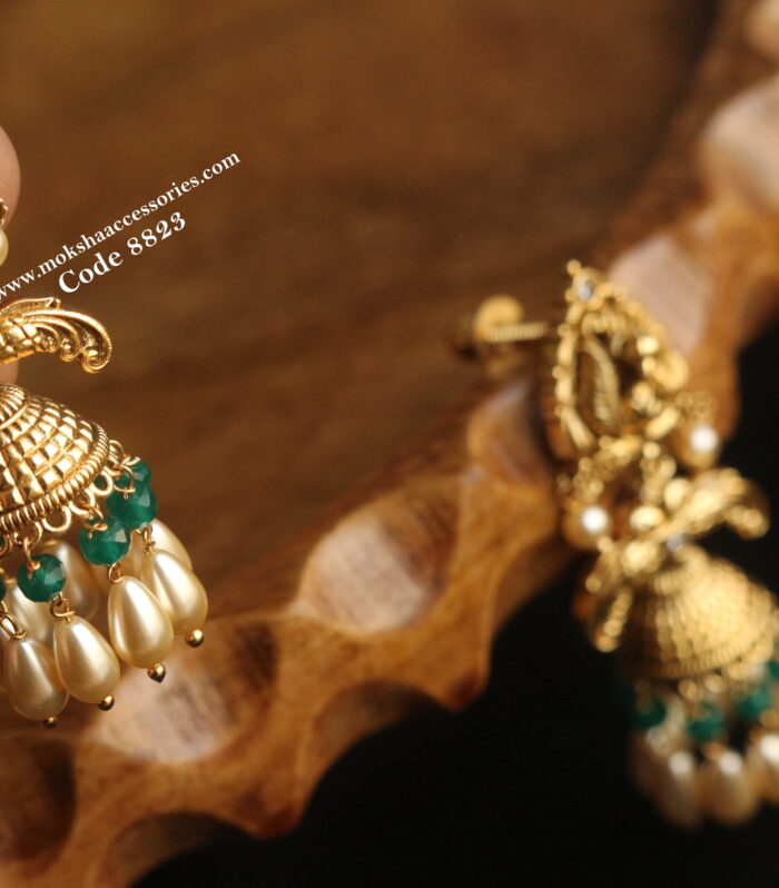 Nakshi jhumki with emerald and sarvoski pearls with back screw