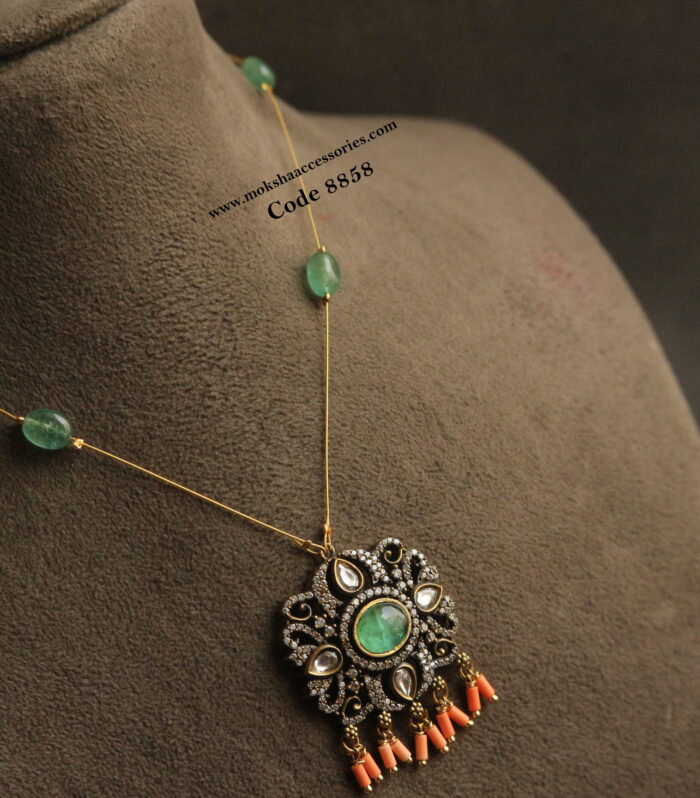 Invisible chain with victorian pendant , corals and emerald beads