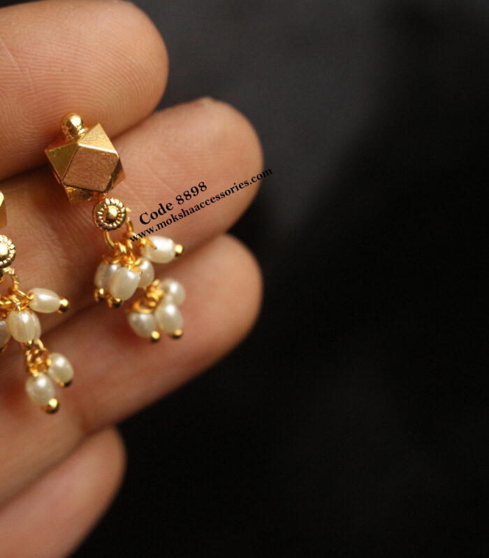 Gold studs with rice pearl drops