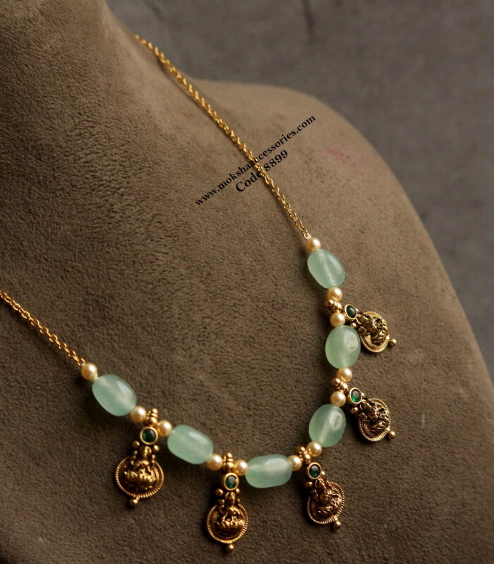 Kasu pendants with onyx beads and gold chain