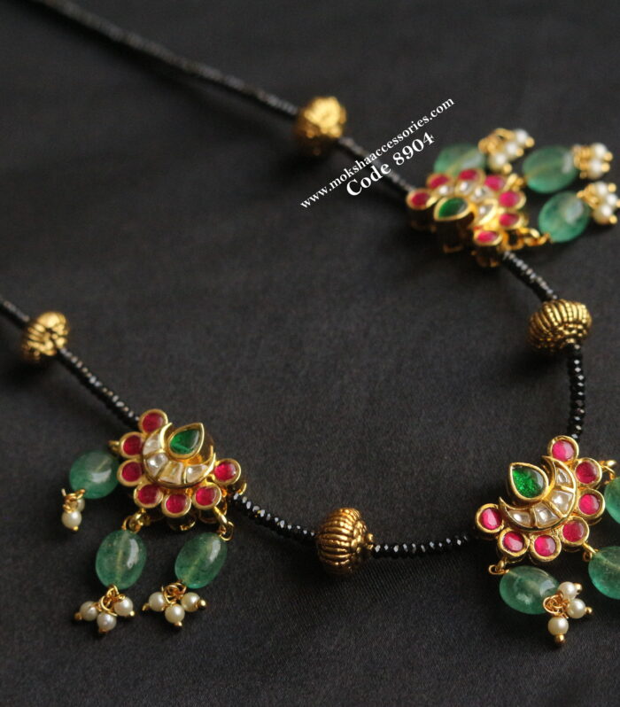 Real black beads with jadaukundan pendants and nakshi gold balls