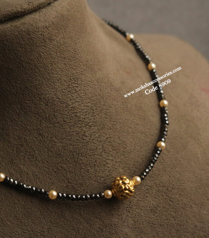 Real cz black beads with antique gold ball and sarvoski pearls