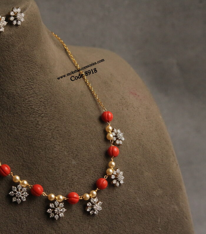 CZ diamond alike pendant set with coral pumpkin beads and sarvoski pearls