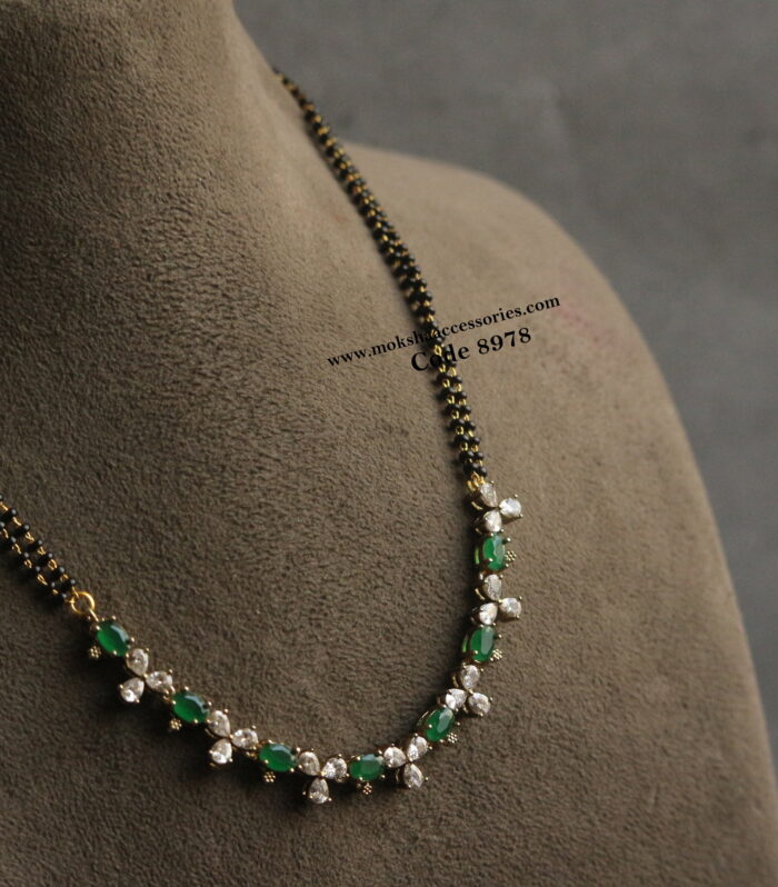 Emerald and cz stone pendant with black beads chain