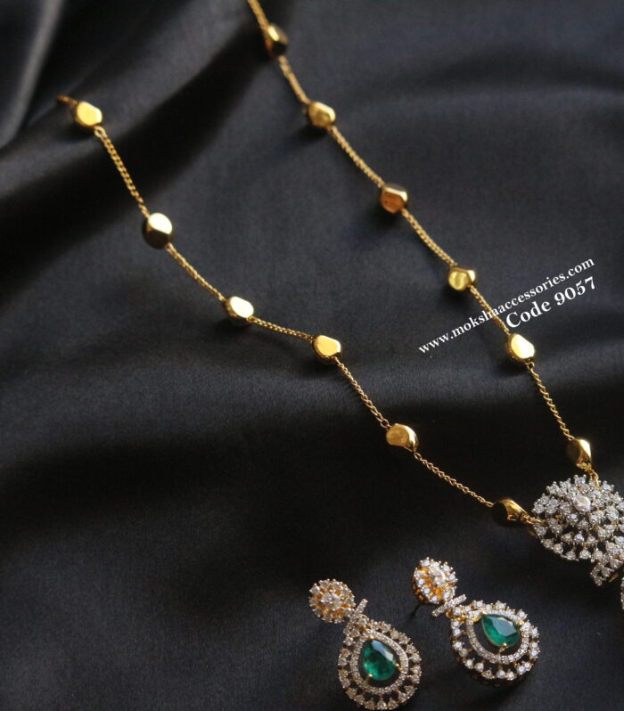 Diamond alike pendant set with gold chain